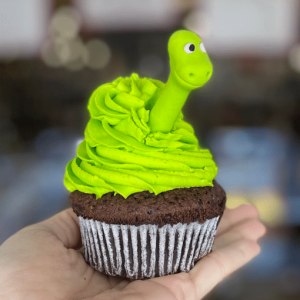 Dinosaur character cupcake